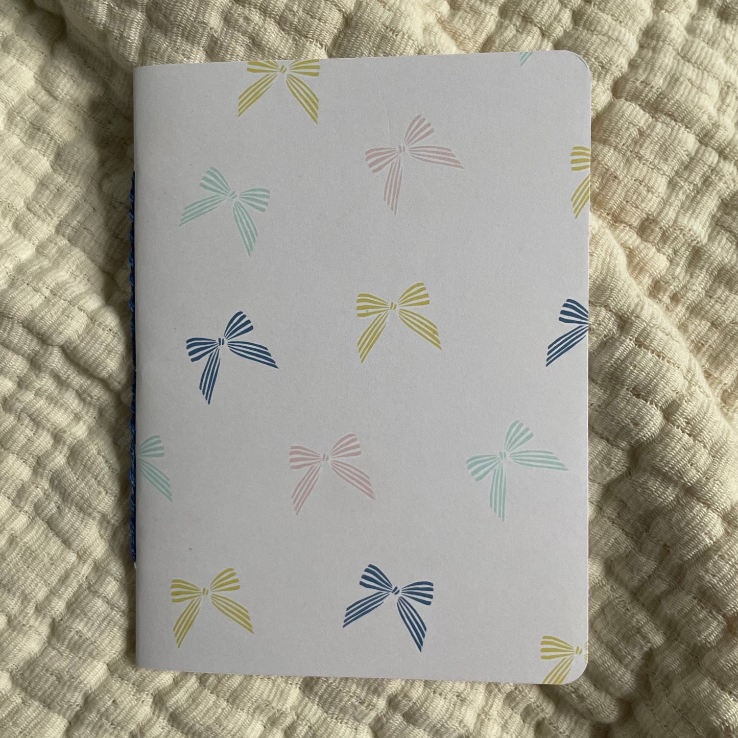 Unlined Bow Pocket Notebook