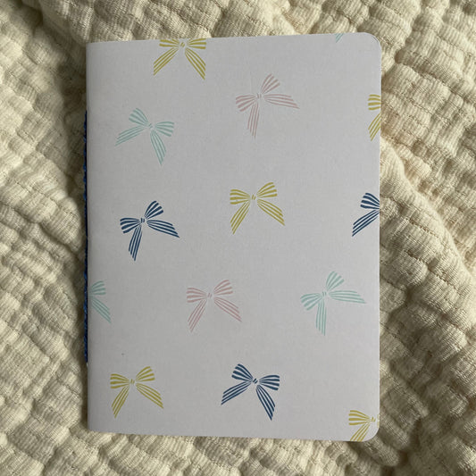 Unlined Bow Pocket Notebook